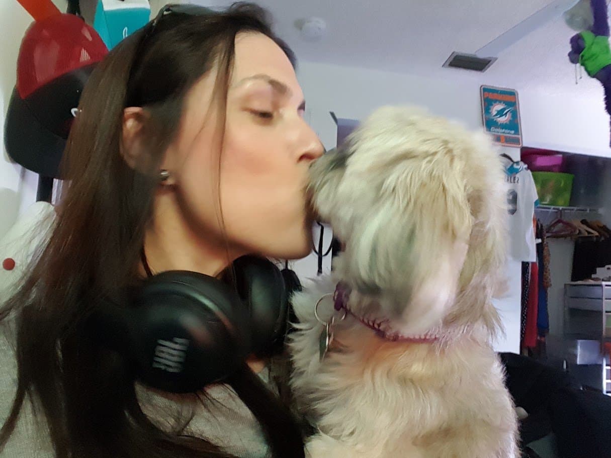 Momma kissing Paris goodbye before leaving for a trip.