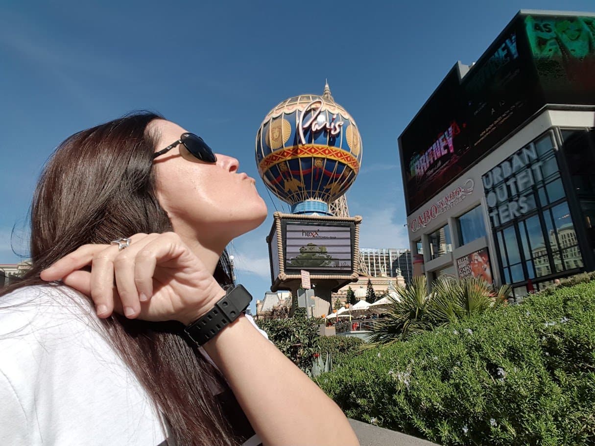Momma looking up at the Paris Las Vegas balloon sign.