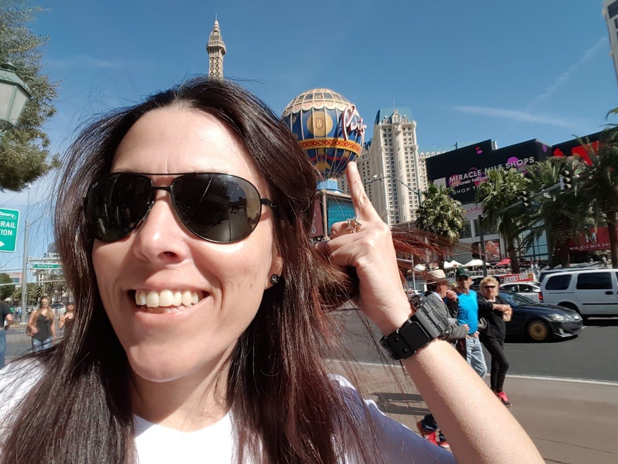 Momma smiling in front of the Paris Las Vegas balloon.